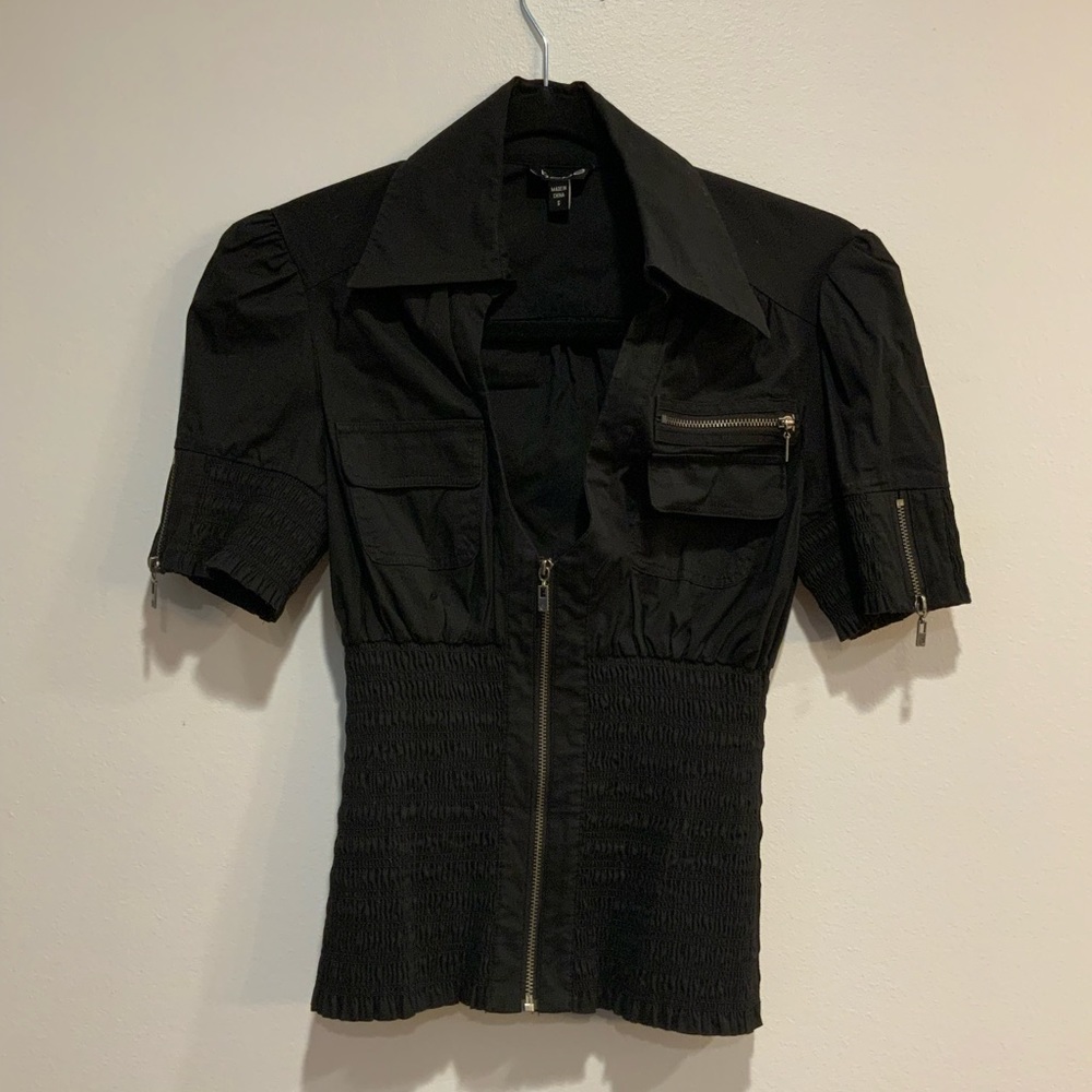 Black zip up top with elasticized bottom and zipper detail